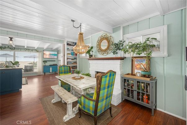 Dining room, Fireplace, Interior, Pendant Lights, Wood Texture Flooring