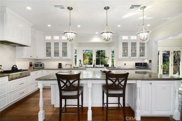 Chandelier, Interior, Kitchen, Pendant Lights, Recessed Lighting, Stainless Steel Appliances, Wood Texture Flooring