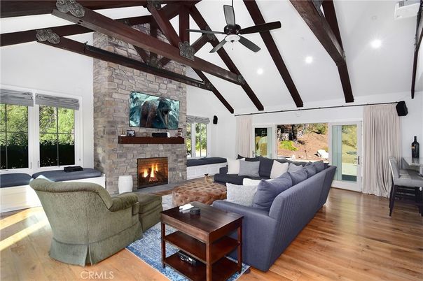 Fireplace, Interior, Living room, Recessed Lighting, Stone Walls, Wooden Beams, Wood Texture Flooring