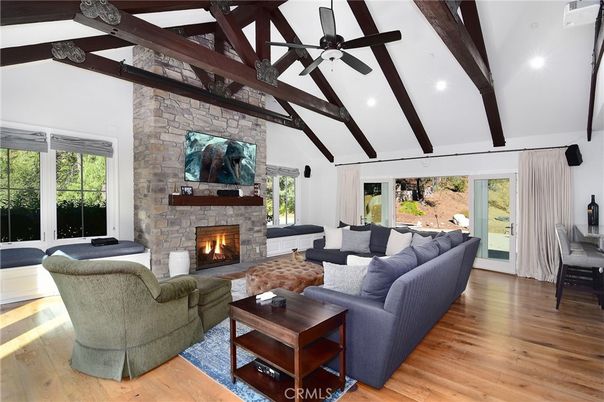 Fireplace, Interior, Living room, Recessed Lighting, Stone Walls, Wooden Beams, Wood Texture Flooring