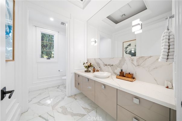 Bathroom, Dual Sink Vanities, Interior, Marble, Marble Walls, Recessed Lighting