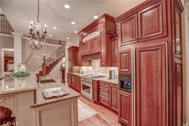 Chandelier, Interior, Kitchen, Recessed Lighting, Stainless Steel Appliances, Wood Texture Flooring