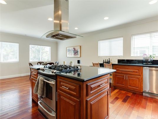 Dining room, Interior, Kitchen, Recessed Lighting, Stainless Steel Appliances, Wood Texture Flooring