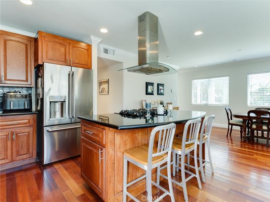 Dining room, Interior, Kitchen, Recessed Lighting, Stainless Steel Appliances, Wood Texture Flooring