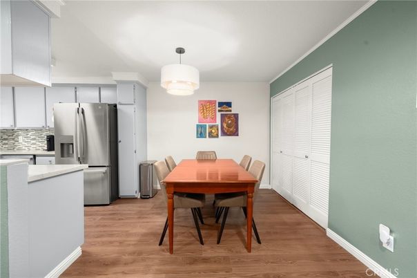 Dining room, Interior, Kitchen, Pendant Lights, Stainless Steel Appliances, Wood Texture Flooring