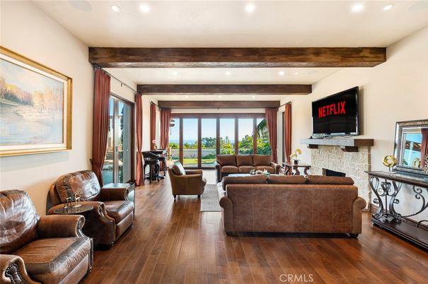 Fireplace, Interior, Living room, Piano, Recessed Lighting, Wooden Beams, Wood Texture Flooring