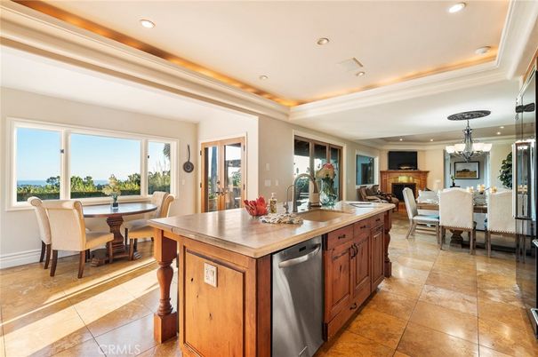 Chandelier, Dining room, Fireplace, Interior, Kitchen, Recessed Lighting, Stainless Steel Appliances