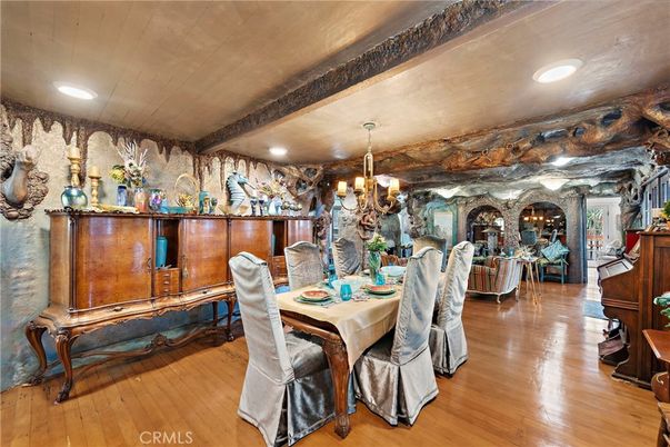 Chandelier, Dining room, Interior, Piano, Recessed Lighting, Stone Walls, Wood Texture Flooring