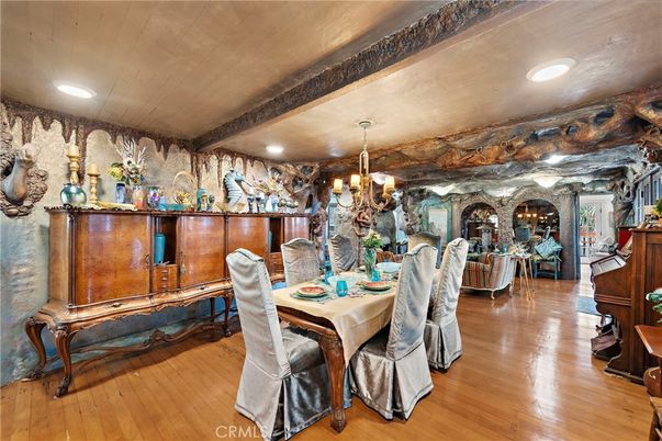 Chandelier, Dining room, Interior, Piano, Recessed Lighting, Stone Walls, Wood Texture Flooring