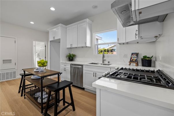 Dining room, Interior, Kitchen, Recessed Lighting, Stainless Steel Appliances, Wood Texture Flooring