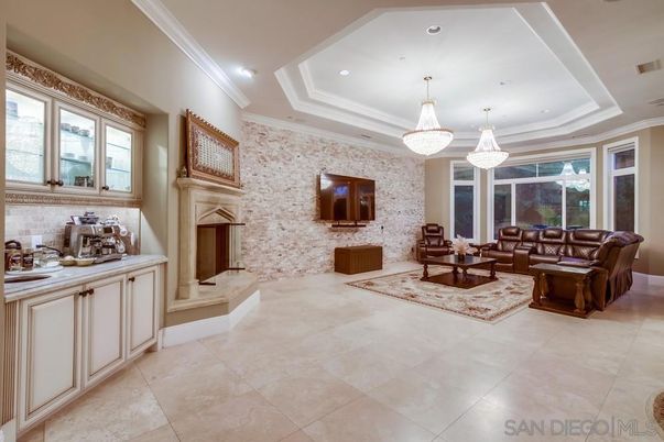 Chandelier, Fireplace, Interior, Living room, Recessed Lighting, Stone Walls