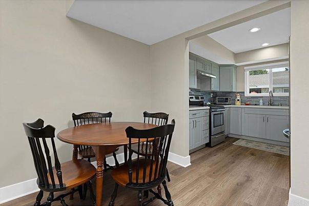 Dining room, Interior, Kitchen, Recessed Lighting, Stainless Steel Appliances, Wood Texture Flooring