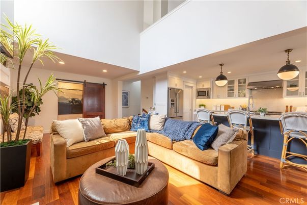 Dining room, Interior, Kitchen, Living room, Pendant Lights, Recessed Lighting, Stainless Steel Appliances, Wood Texture Flooring