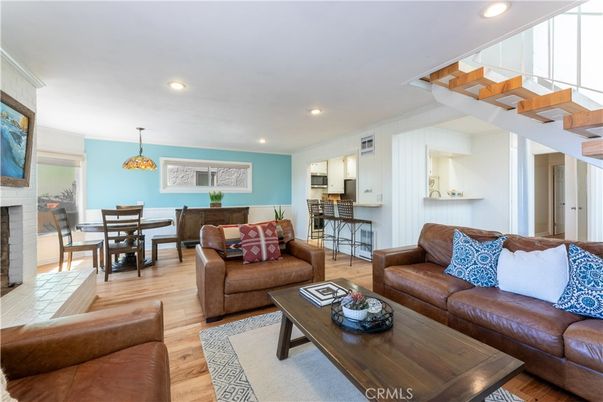 Dining room, Fireplace, Interior, Living room, Pendant Lights, Recessed Lighting, Wood Texture Flooring