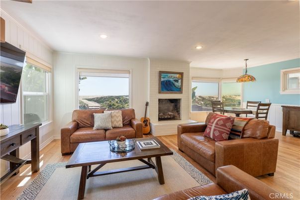 Dining room, Fireplace, Interior, Living room, Pendant Lights, Recessed Lighting, Wood Texture Flooring