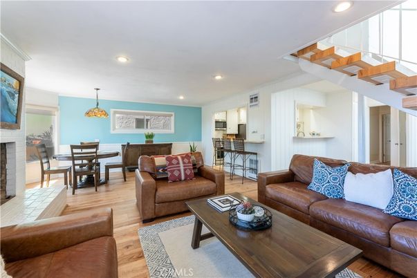 Dining room, Fireplace, Interior, Living room, Pendant Lights, Recessed Lighting, Wood Texture Flooring