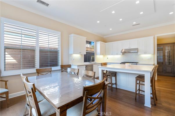 Dining room, Interior, Kitchen, Recessed Lighting, Stainless Steel Appliances, Wood Texture Flooring