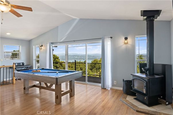 Billiard Table, Fireplace, Game Room, Interior, Recessed Lighting, Wood Texture Flooring