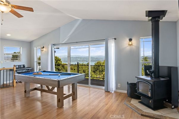 Billiard Table, Fireplace, Game Room, Interior, Recessed Lighting, Wood Texture Flooring