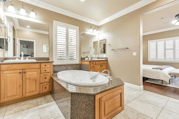 Bathroom, Dual Sink Vanities, Interior, Recessed Lighting, Wood Texture Flooring