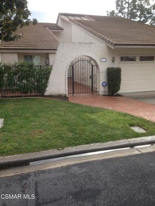 Attached, Exterior, Facade, Spanish Mediterranean