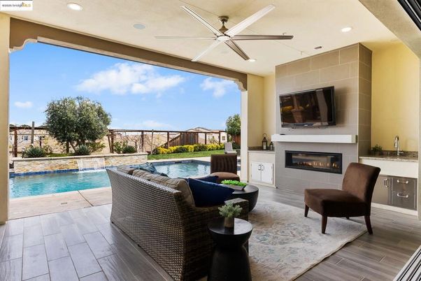 Exterior, Fireplace, Pool, Recessed Lighting, Wood Texture Flooring
