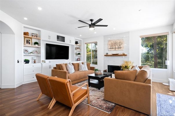 Fireplace, Interior, Living room, Recessed Lighting, Stone Walls, Wood Texture Flooring