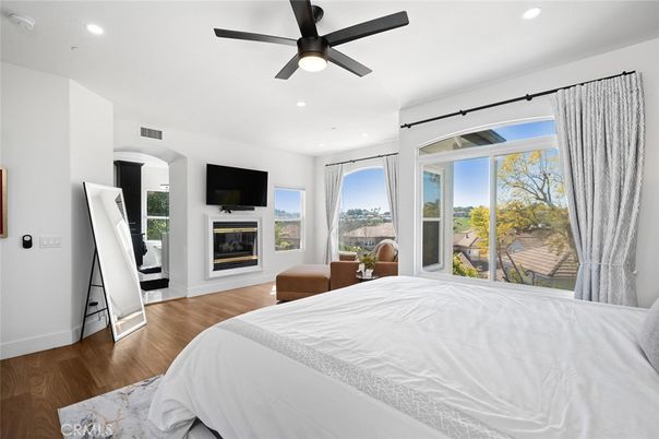 Bedroom, Fireplace, Interior, Recessed Lighting, Wood Texture Flooring
