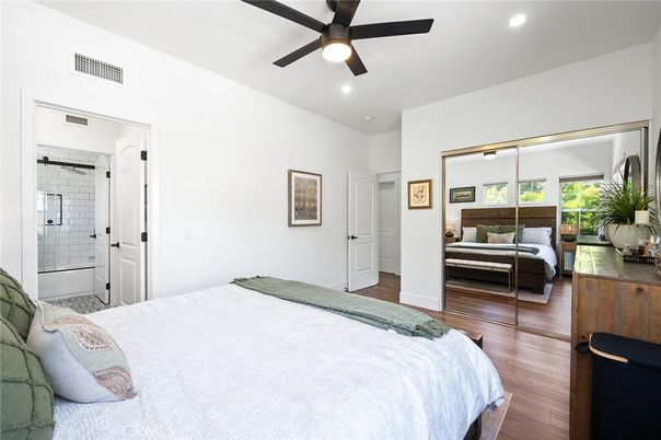 Bathroom, Bedroom, Glass Shower, Interior, Recessed Lighting, Wood Texture Flooring