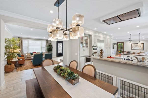 Dining room, Interior, Kitchen, Living room, Pendant Lights, Recessed Lighting, Stainless Steel Appliances, Wood Texture Flooring