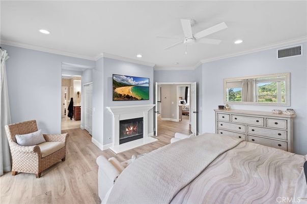 Bedroom, Fireplace, Interior, Recessed Lighting, Wood Texture Flooring