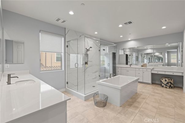 Bathroom, Dual Sink Vanities, Free Standing Baths, Glass Shower, Interior, Marble Walls, Recessed Lighting