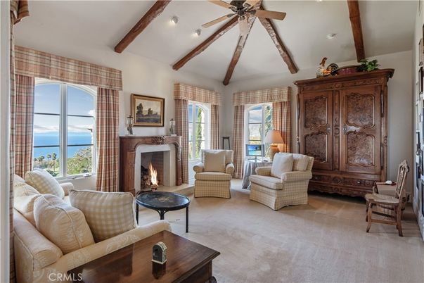 Fireplace, Interior, Living room, Recessed Lighting, Water, Wooden Beams