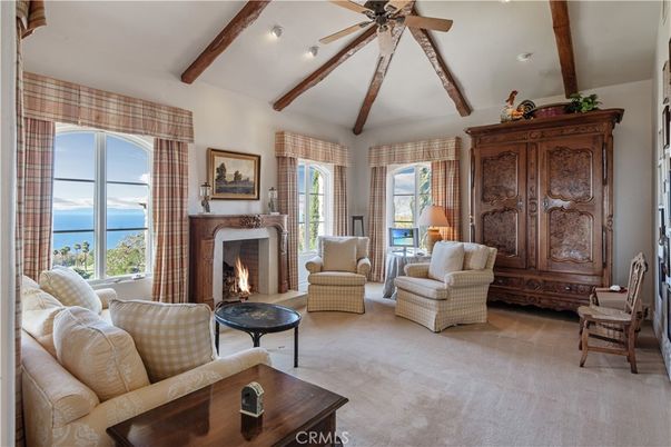 Fireplace, Interior, Living room, Recessed Lighting, Water, Wooden Beams