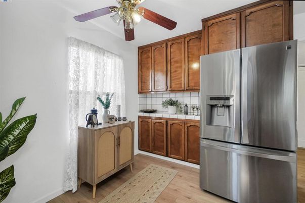 Interior, Kitchen, Stainless Steel Appliances, Tile Countertops, Wood Texture Flooring