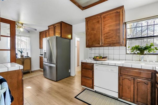 Interior, Kitchen, Tile Countertops, Wood Texture Flooring