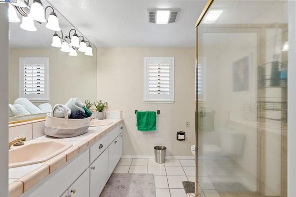 Bathroom, Dual Sink Vanities, Glass Shower, Interior, Tile Countertops