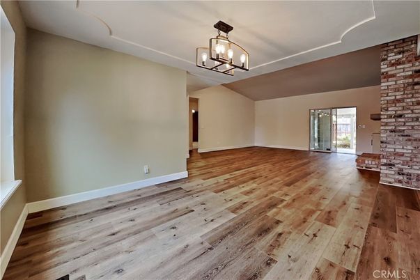 Chandelier, Empty room, Interior, Pendant Lights, Stone Walls, Wood Texture Flooring