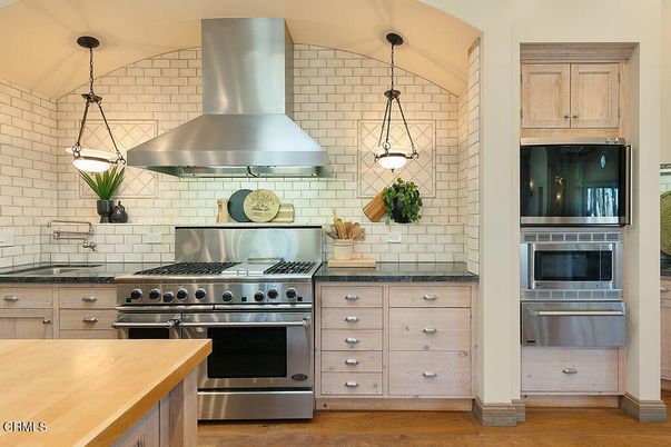 Interior, Kitchen, Pendant Lights, Stainless Steel Appliances, Stone Walls, Wood Texture Flooring