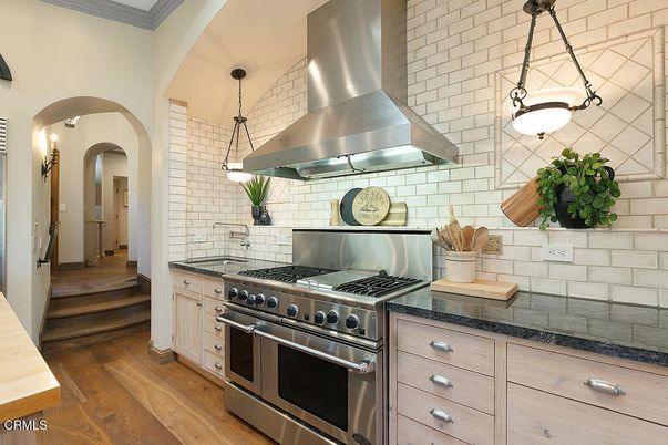 Interior, Kitchen, Pendant Lights, Stainless Steel Appliances, Stone Walls, Wood Texture Flooring