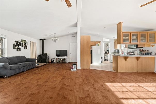 Chandelier, Fireplace, Interior, Kitchen, Recessed Lighting, Wood Texture Flooring