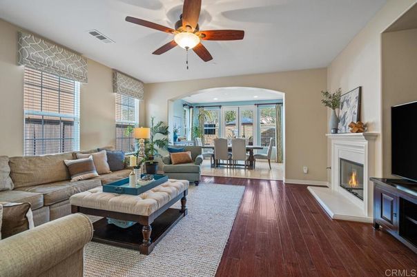 Dining room, Fireplace, Interior, Living room, Recessed Lighting, Wood Texture Flooring