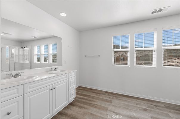 Bathroom, Dual Sink Vanities, Interior, Recessed Lighting, Wood Texture Flooring