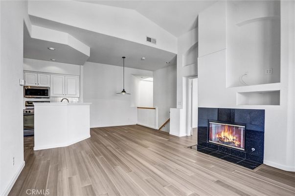 Fireplace, Interior, Kitchen, Pendant Lights, Recessed Lighting, Wood Texture Flooring