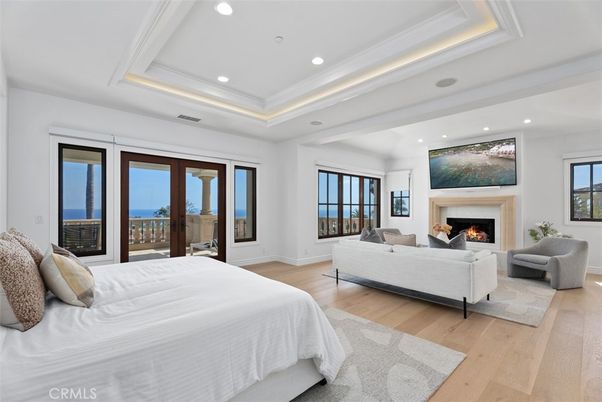Bedroom, Fireplace, Interior, Recessed Lighting, Water, Wood Texture Flooring