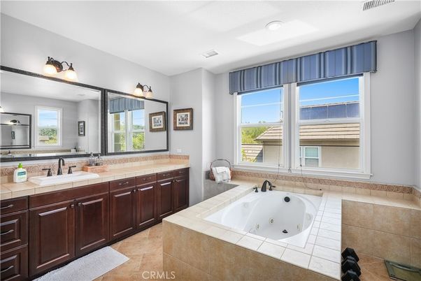 Bathroom, Dual Sink Vanities, Interior, Recessed Lighting, Tile Countertops