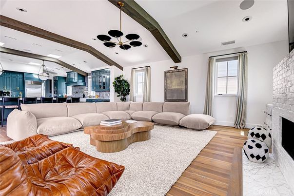 Fireplace, Interior, Kitchen, Living room, Pendant Lights, Recessed Lighting, Stainless Steel Appliances, Stone Walls, Wooden Beams, Wood Texture Flooring