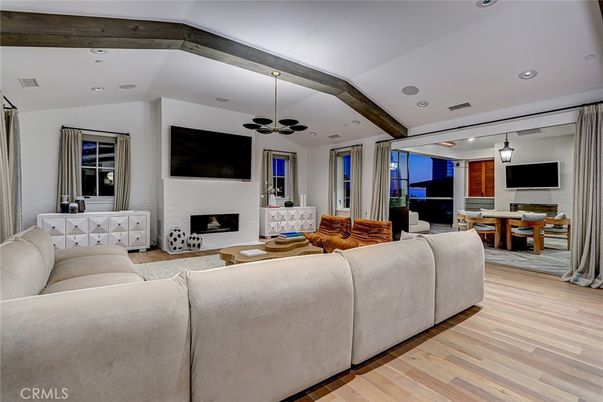 Dining room, Fireplace, Interior, Living room, Recessed Lighting, Wood Texture Flooring