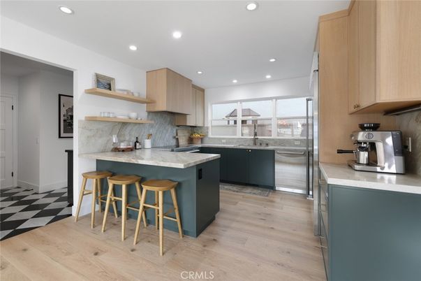 Interior, Kitchen, Marble Walls, Recessed Lighting, Stainless Steel Appliances, Wood Texture Flooring