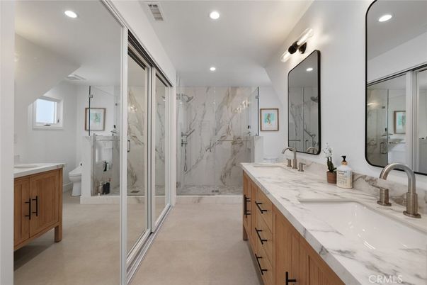 Bathroom, Dual Sink Vanities, Glass Shower, Interior, Marble Walls, Recessed Lighting